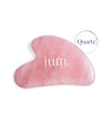 Pierre Gua Sha en quartz rose ium sur fond blanc 